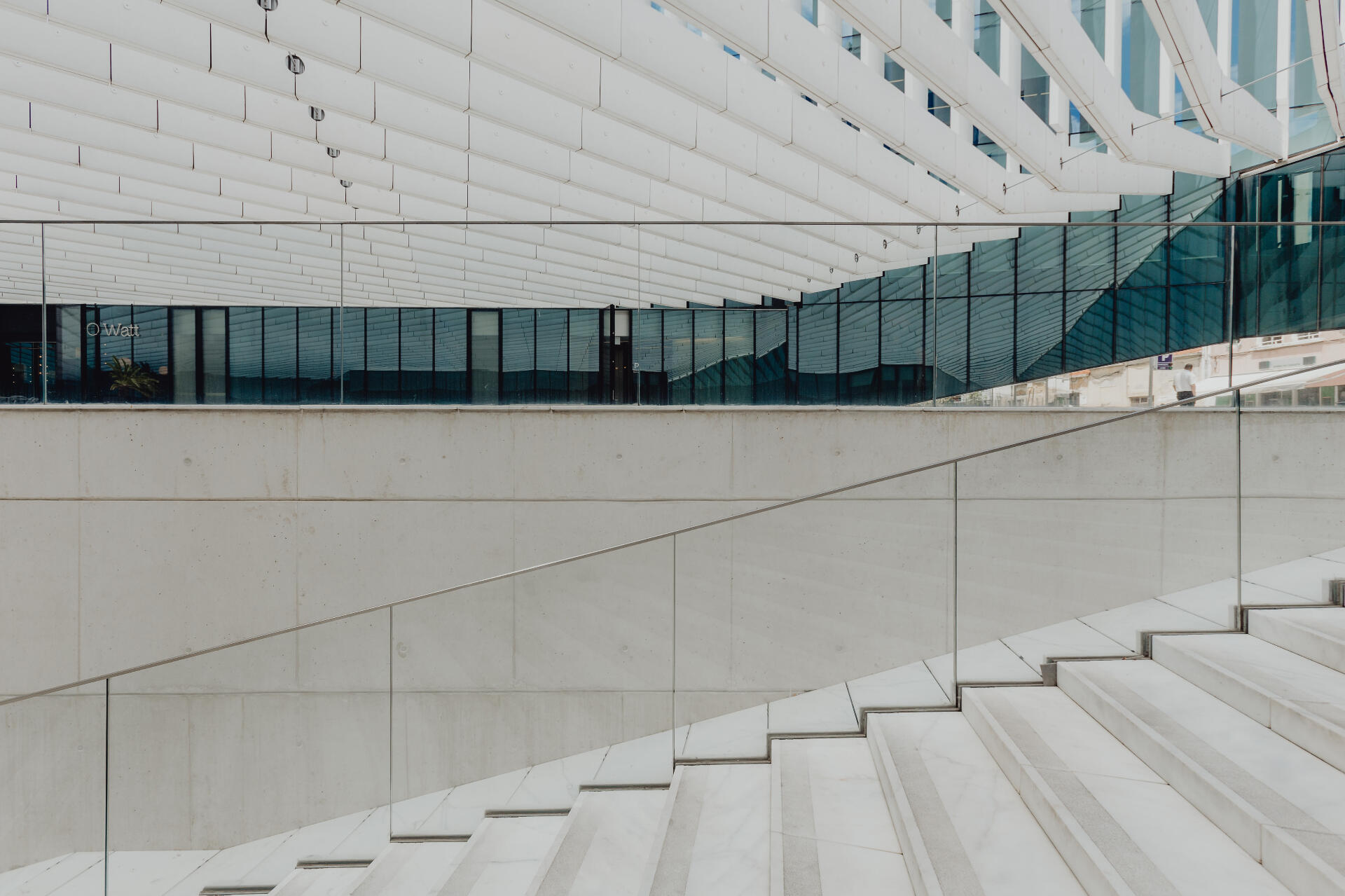 Steps adjacent to a ramp.